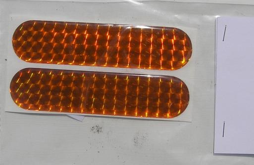 Pružná odrazka plastická ohebná nalepovací samolepicí 7 x 2,5cm